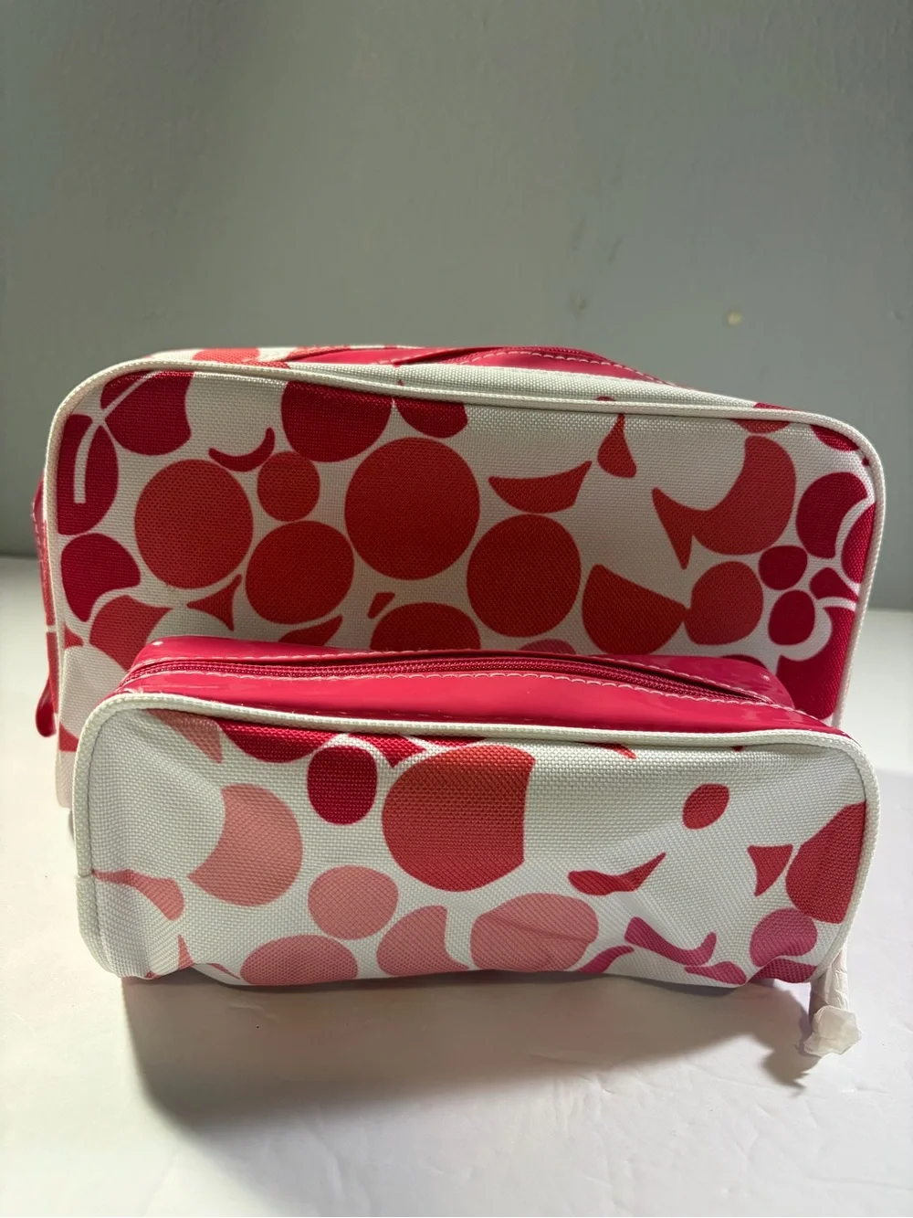 Pink and White Patterned Cosmetic Pouch Set